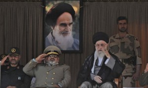 Supreme Leader Ayatollah Ali Khamenei, right, attends a graduation ceremony of army cadets, accompanied by Revolutionary Guard commander Mohammad Ali Jafari, left, Chief of the General Staff of Iran's Armed Forces, Hasan Firouzabadi, second left in Tehran, Iran, Saturday, Oct. 5 2013. (AP Photo/Office of the Iranian Supreme Leader)