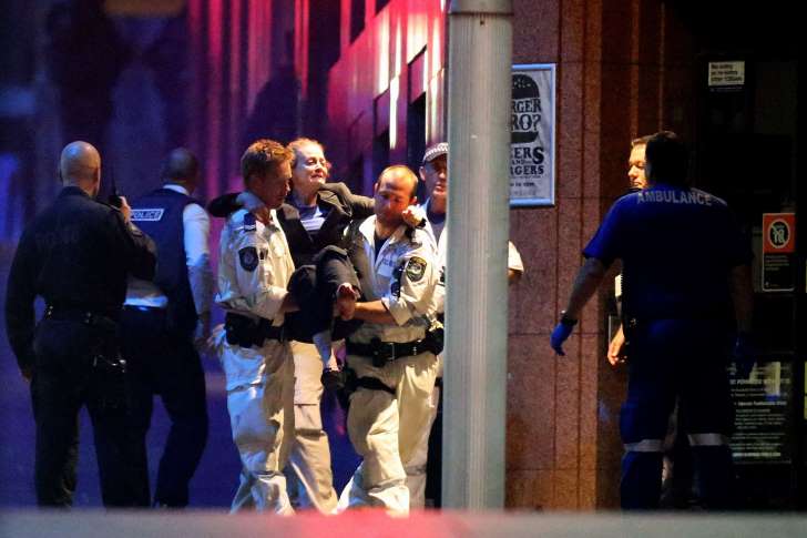 WATCH: Police Storm Sydney Cafe