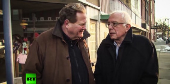 Bernie Cozies Up to Pooty’s Mouthpiece